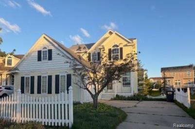 88 Champlain Boulevard, Howell, MI 48843 — front exterior