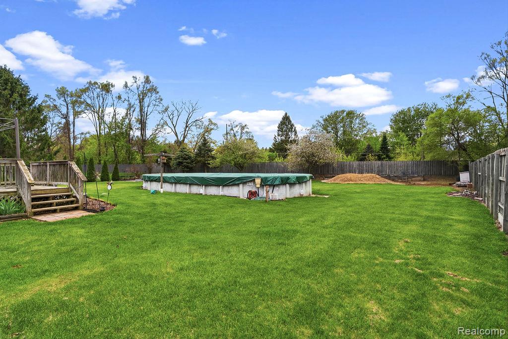 4713 Desert Bridge Court, Highland, MI 48356 — Photo 8