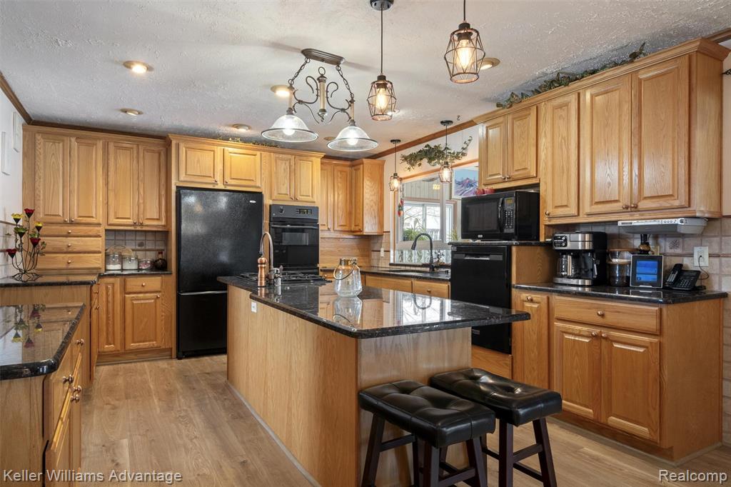 340 Angola Street, Wolverine Lake, MI 48390 — Photo 21