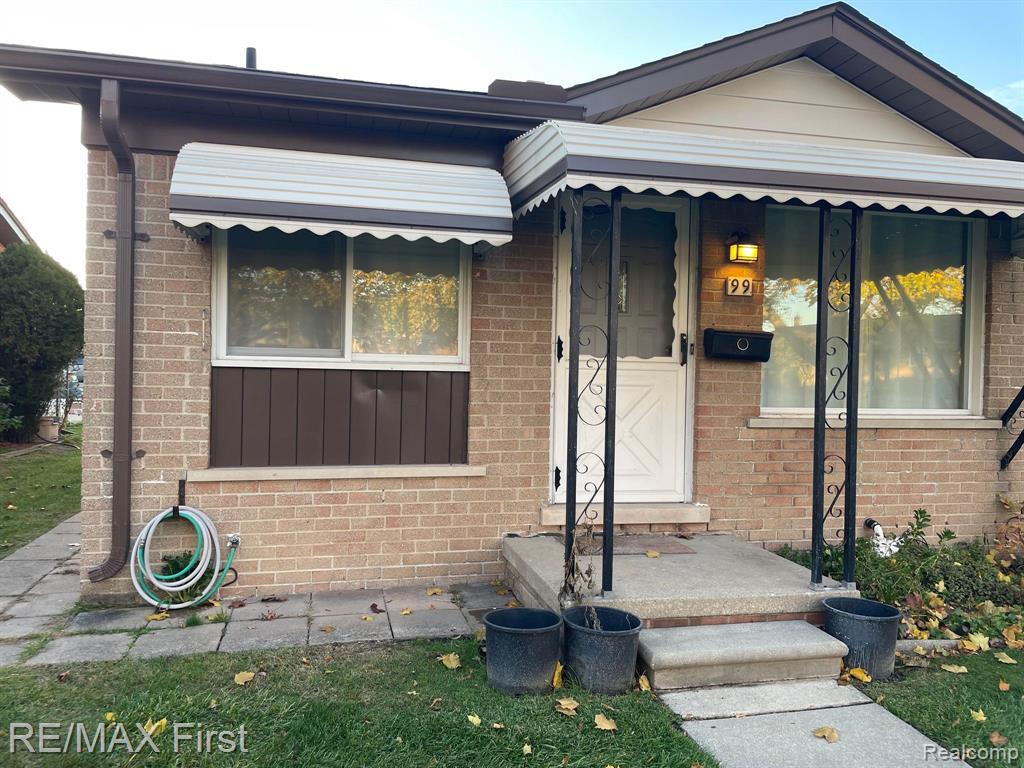 8401 18 Mile APT # 99 Road, Sterling Heights, MI 48313 — front exterior