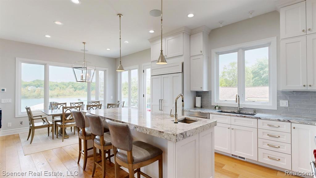 571 Dunleavy Drive, Highland, MI 48356 — Photo 11