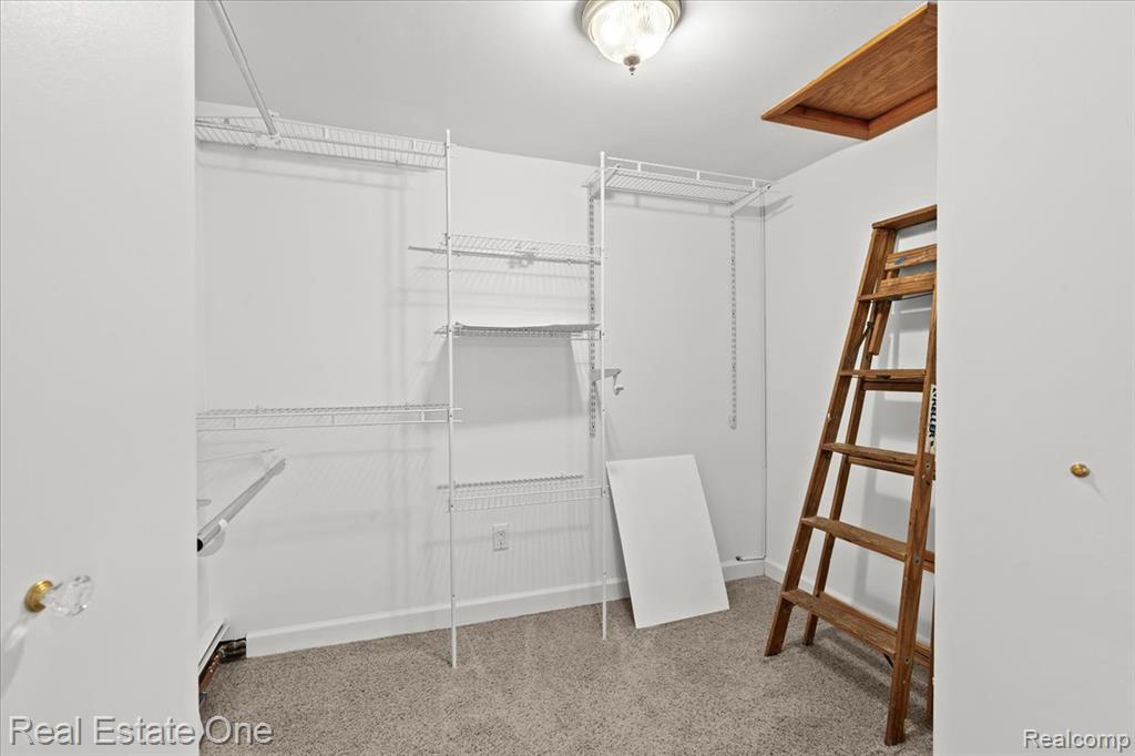 265 Oak Island Drive, Wolverine Lake, MI 48390 — Photo 24