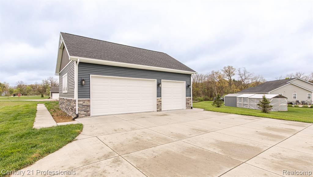 4914 Toratola Lane, Howell, MI 48843 — Photo 33
