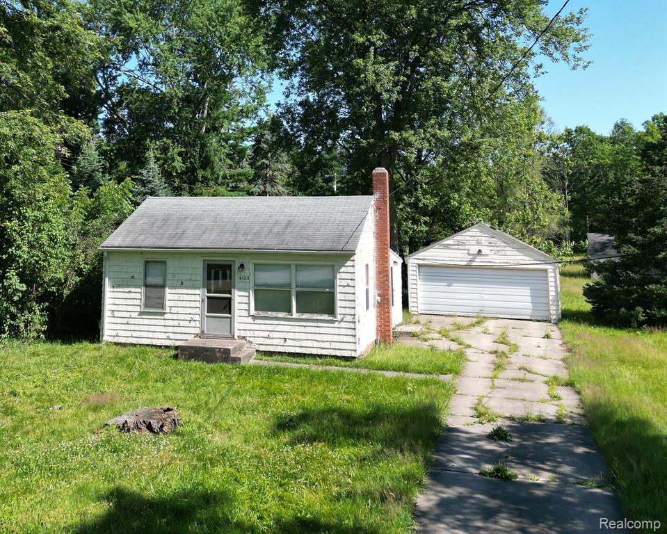 6123 E ATHERTON Road, Burton, MI 48519 — front exterior