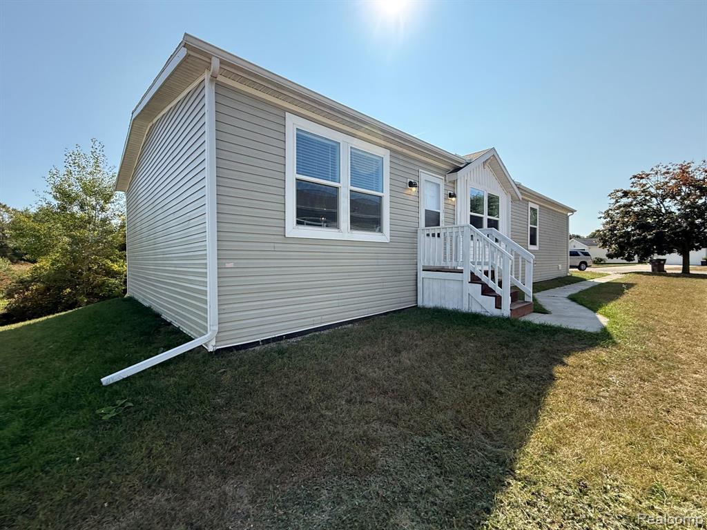 1553 Larkmore Lane, Grass Lake, MI 49240 — front exterior