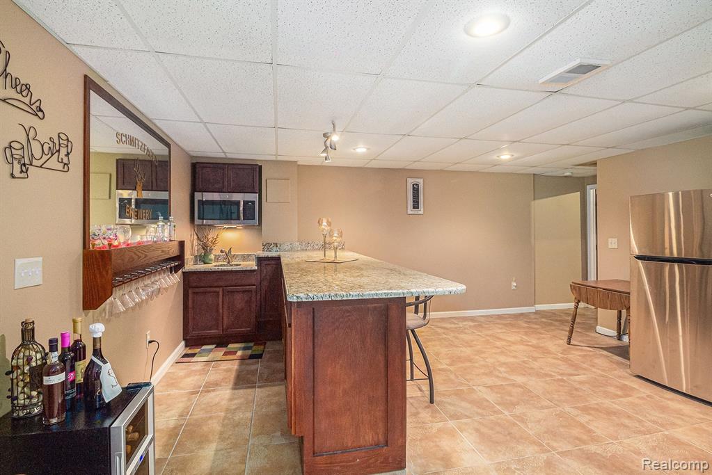 57598 HIDDEN TIMBERS Drive, South Lyon, MI 48178 — Photo 24