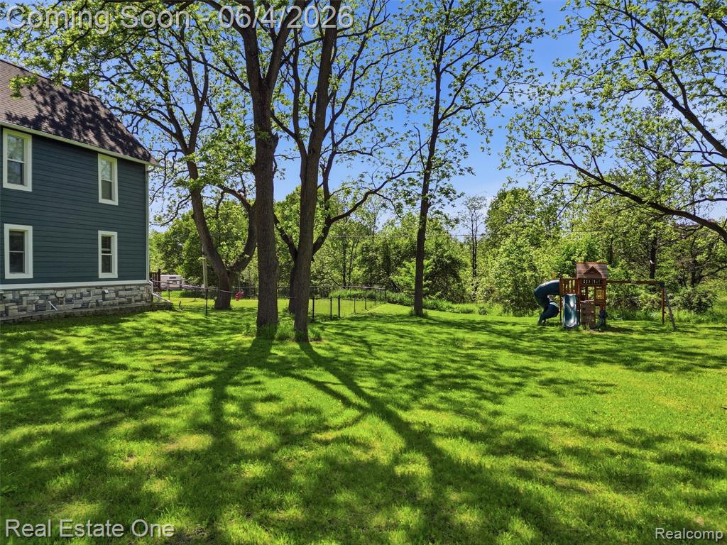 879 N Hacker Road, Howell, MI 48843 — Photo 12