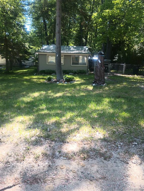 4910 Edgewood Drive, Harrison, MI 48625 — front exterior