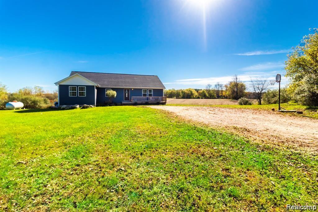 4147 W BARNES LAKE Road, Columbiaville, MI 48421 — front exterior