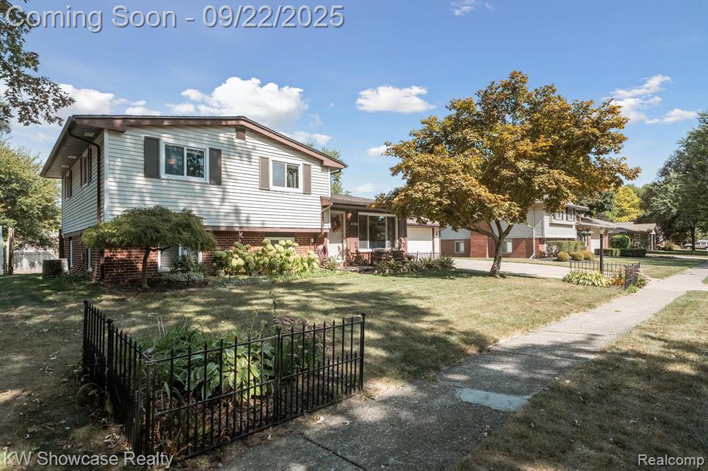 8700 Ringwood Drive, Commerce Twp, MI 48382 — front exterior