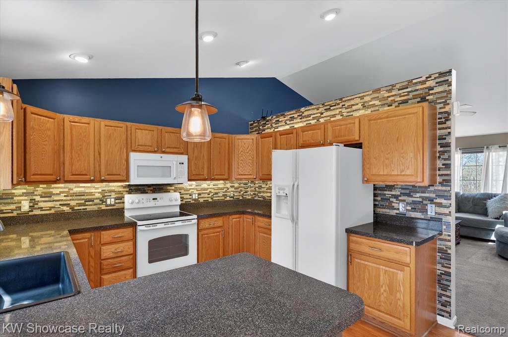 662 Tierney Avenue, Highland, MI 48356 — Photo 12