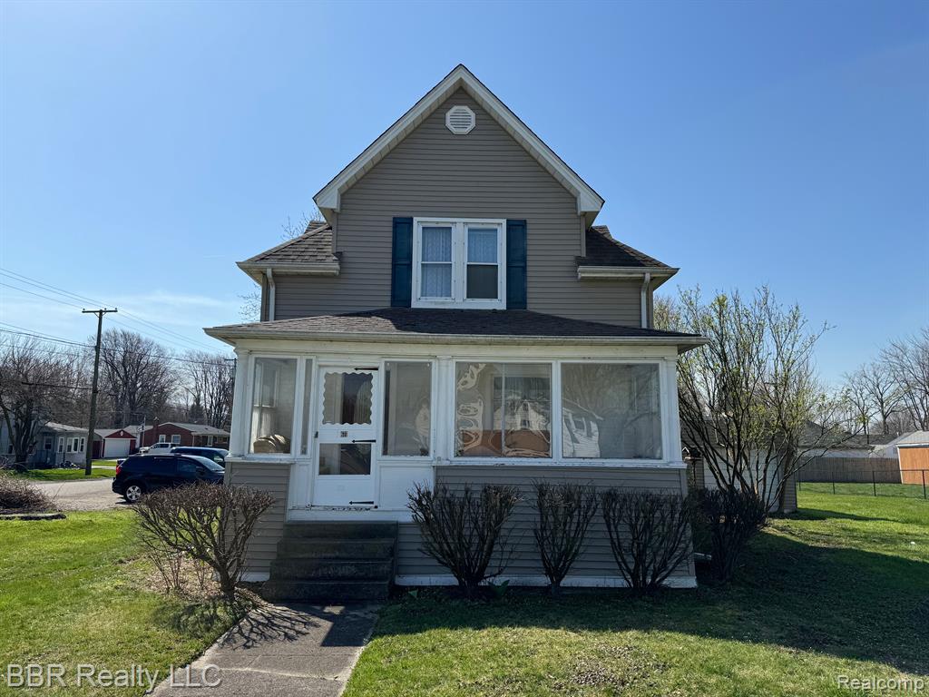 611 MONROE Street, Carleton, MI 48117 — front exterior