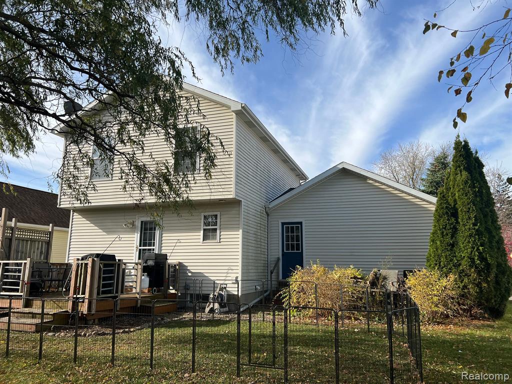 744 VILLAGE Drive, Fowlerville, MI 48836 — Photo 2