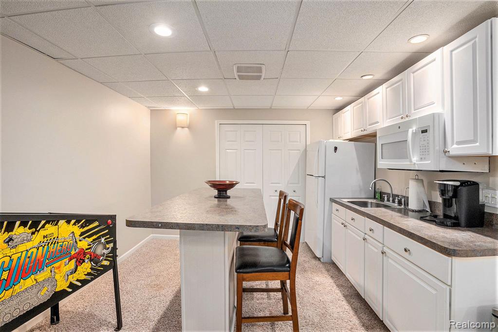 1799 Elkridge Circle, Highland, MI 48356 — Photo 27