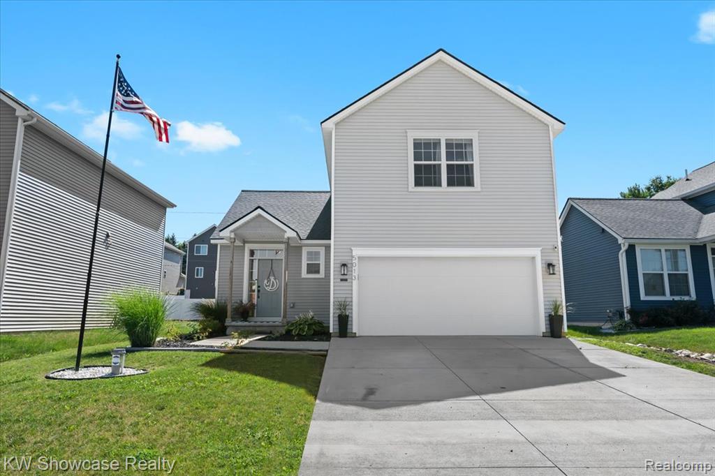 5013 Walsh Drive, Brighton, MI 48114 — front exterior