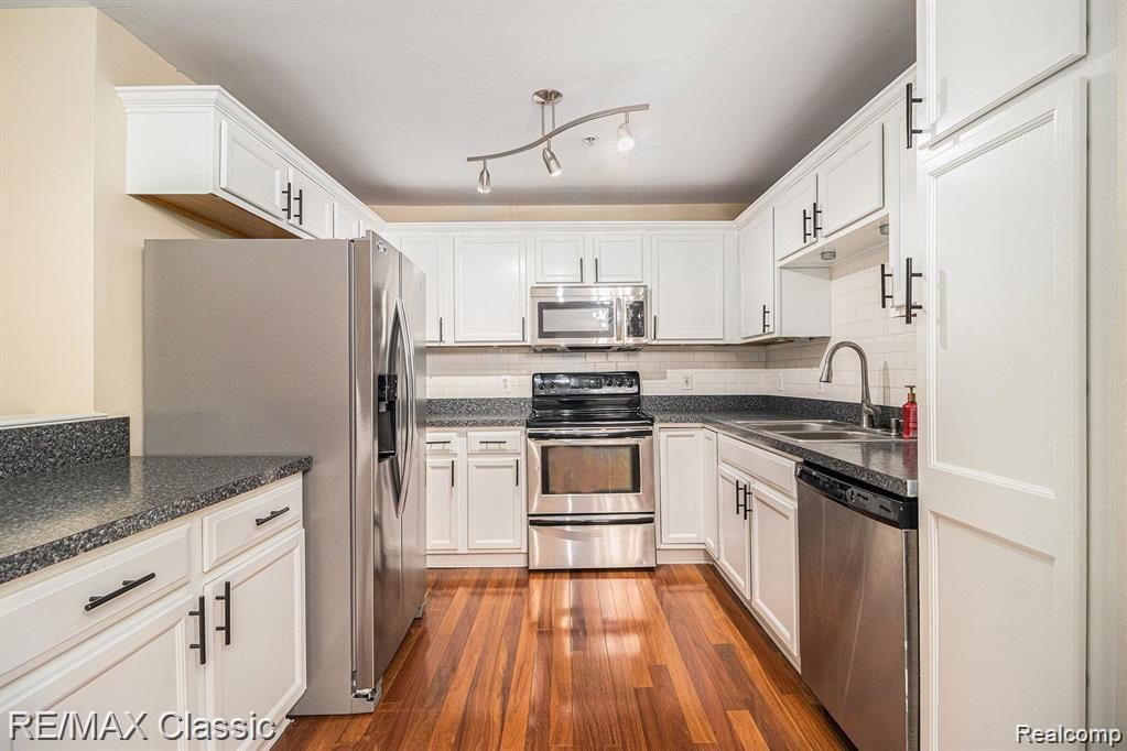 428 Boardwalk Drive, Walled Lake, MI 48390 — Photo 11