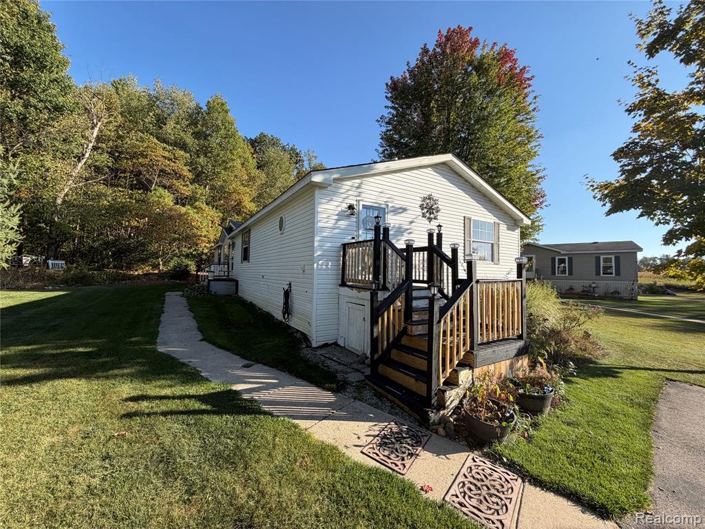 8489 Barkwood Circle, Fenton, MI 48430 — front exterior