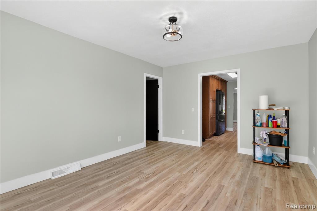 677 Lucille Drive, Wolverine Lake, MI 48390 — Photo 17
