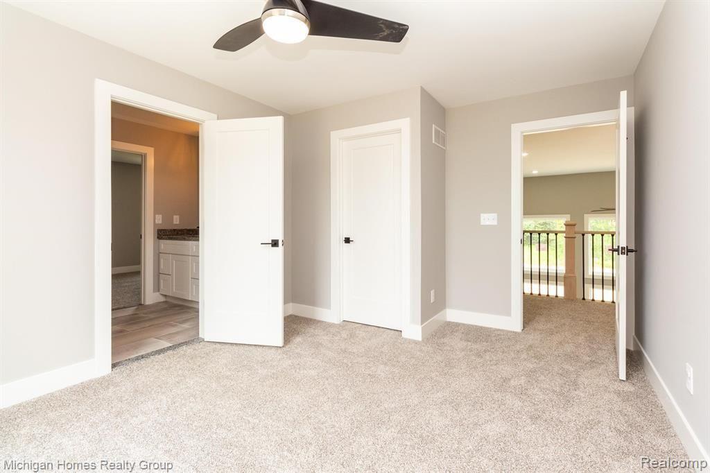 2910 LOON Drive, Wixom, MI 48393 — Photo 41