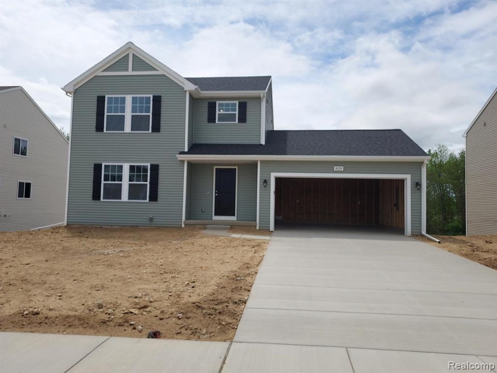8119 Moonlight Creek Lane, Fowlerville, MI 48836 — front exterior