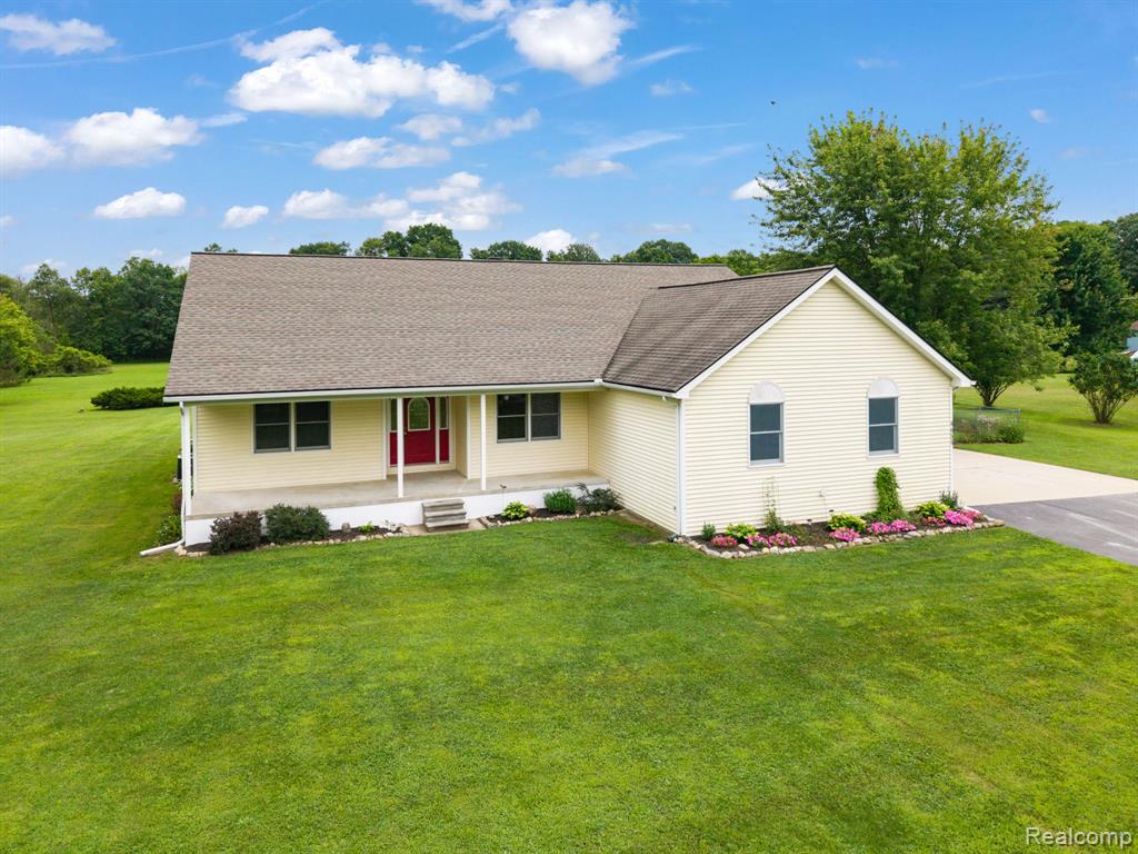 4653 6 Mile Road, South Lyon, MI 48178 — front exterior