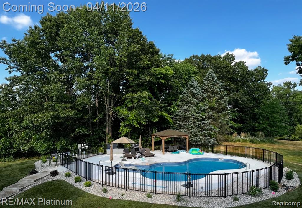 8757 Pebble Creek Drive, Pinckney, MI 48169 — Photo 56