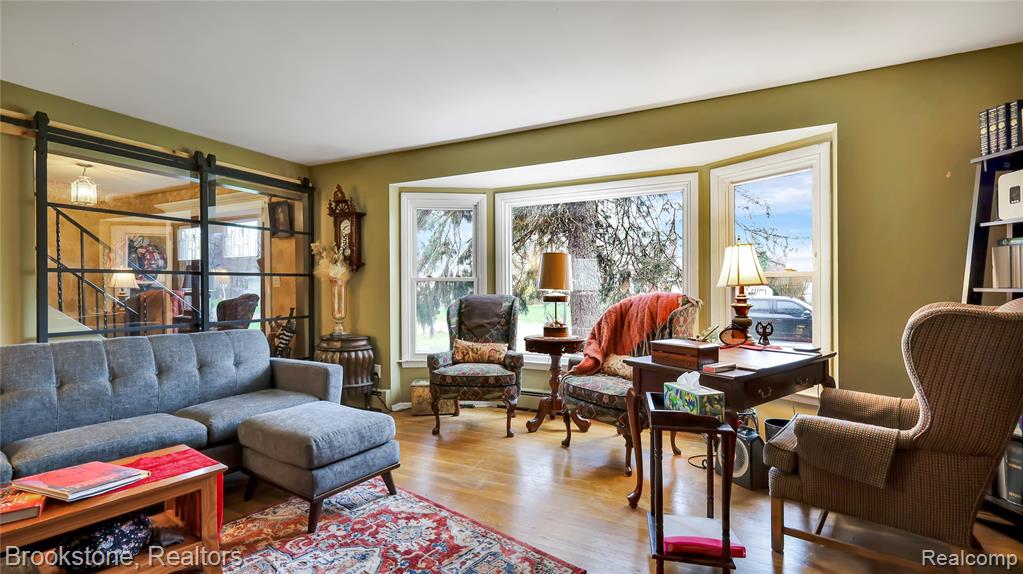 Living area featuring wood finished floors