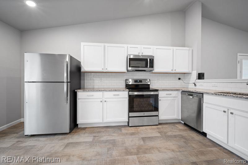 2869 W Sycamore River Drive, Fowlerville, MI 48836 — Photo 5