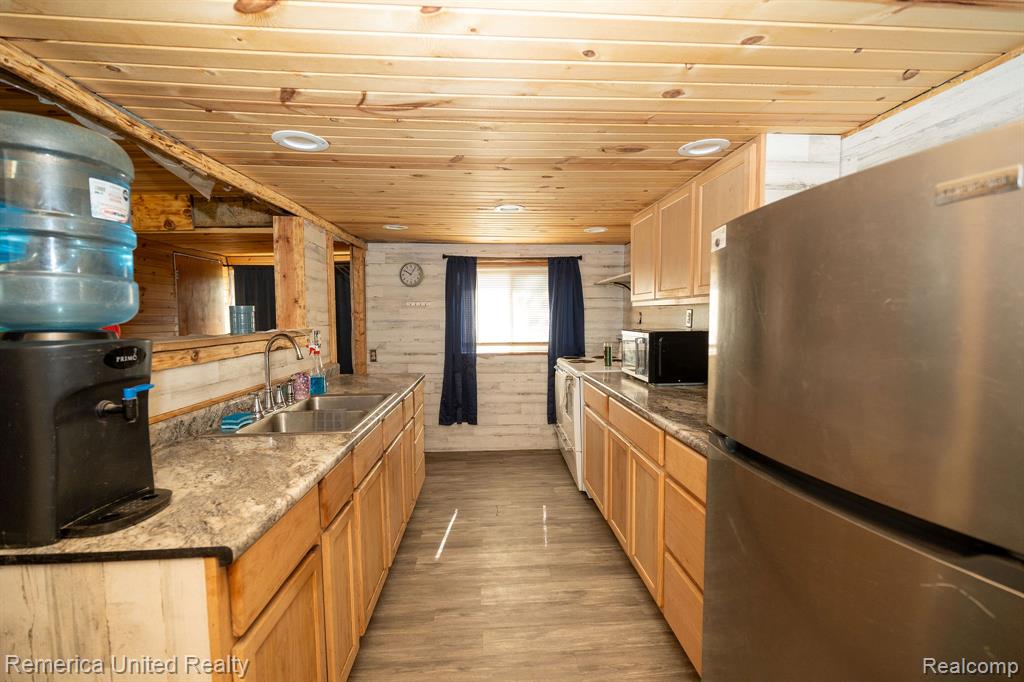 106 Devonshire Drive, Prudenville, MI 48651 — Photo 16