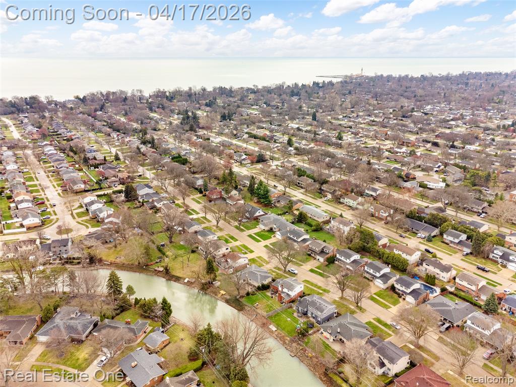 Aerial view of residential area with a nearby body of water