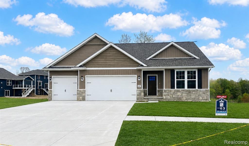 688 Round Rock Drive, Howell, MI 48843 — front exterior
