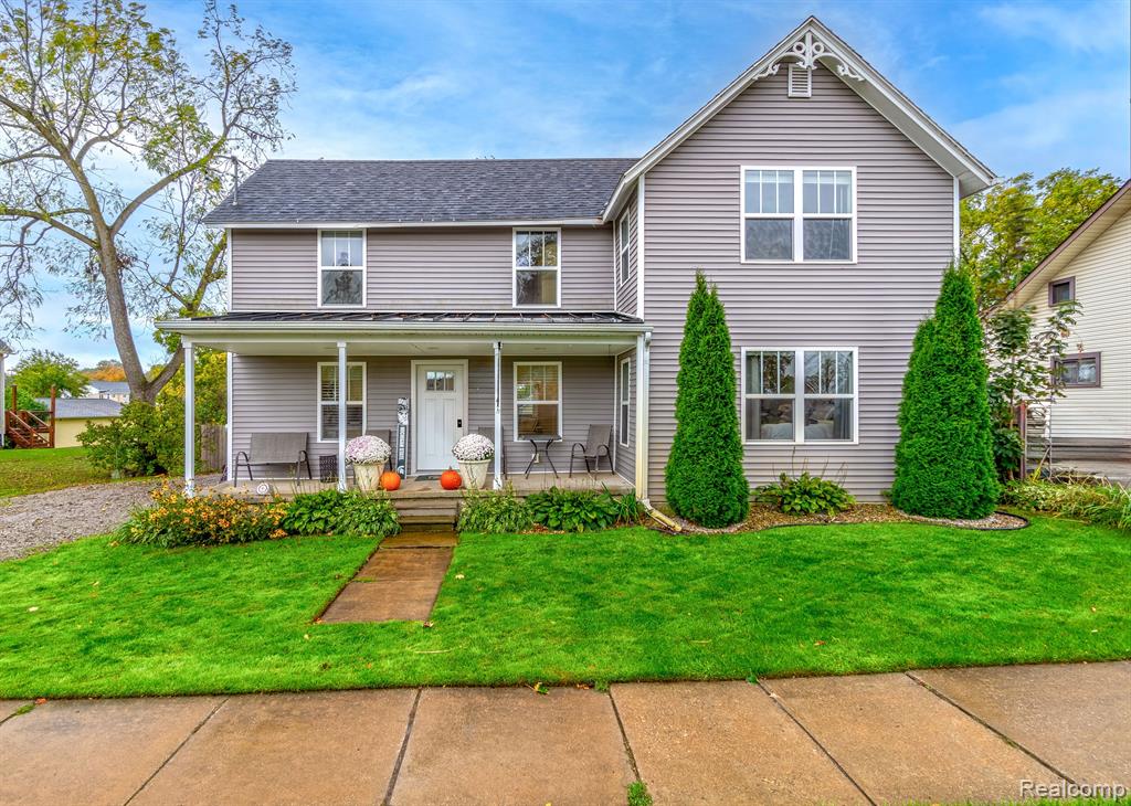 10174 HEGEL Road, Goodrich Vlg, MI — front exterior