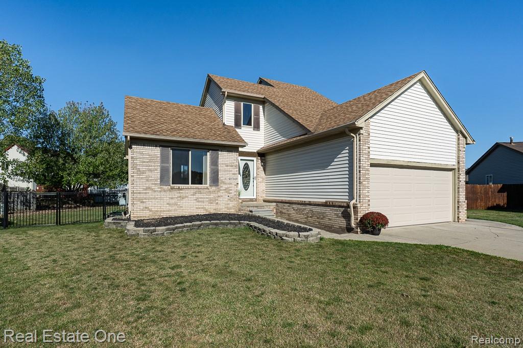 48749 Smokey Glen Court, New Baltimore, MI — front exterior