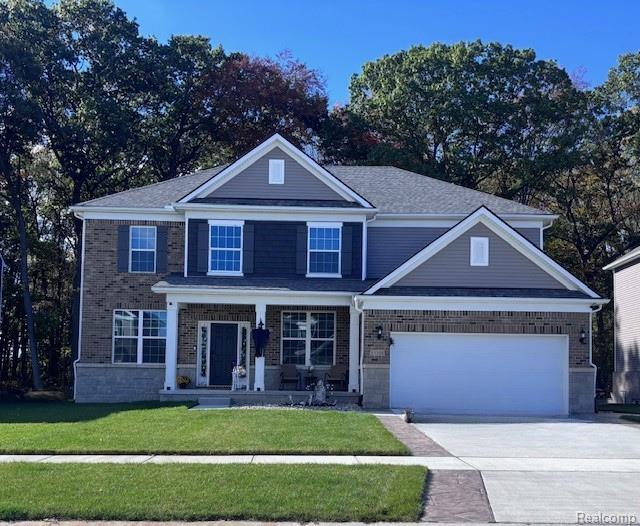 51105 Deerbrook Drive, Macomb, MI 48042 — front exterior