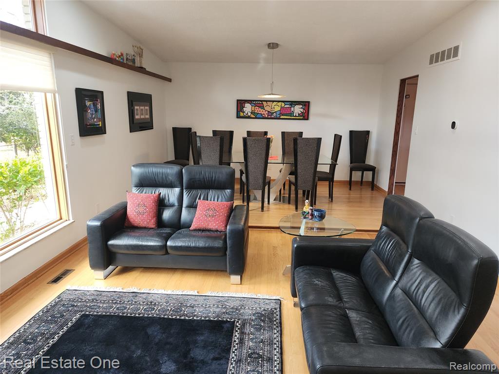 Living area featuring wood finished floors