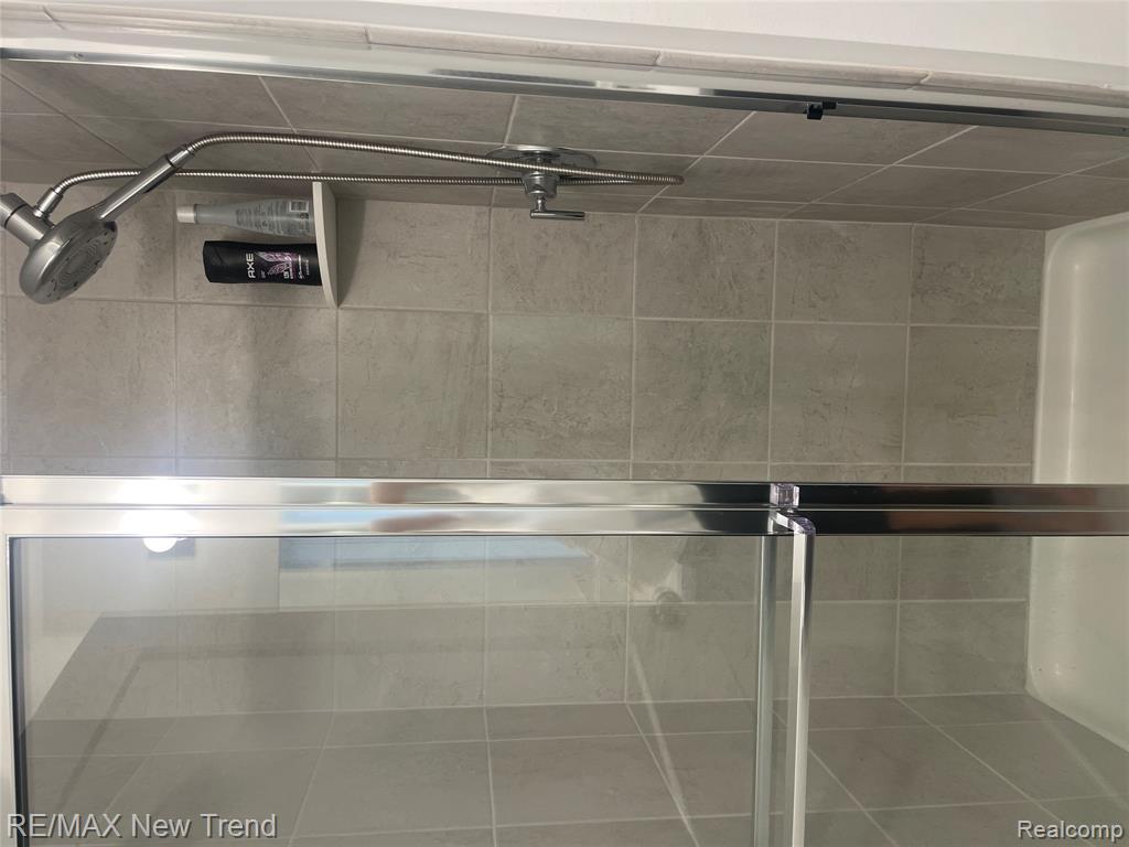 205 Monument Lane, Wixom, MI 48393 — Photo 17