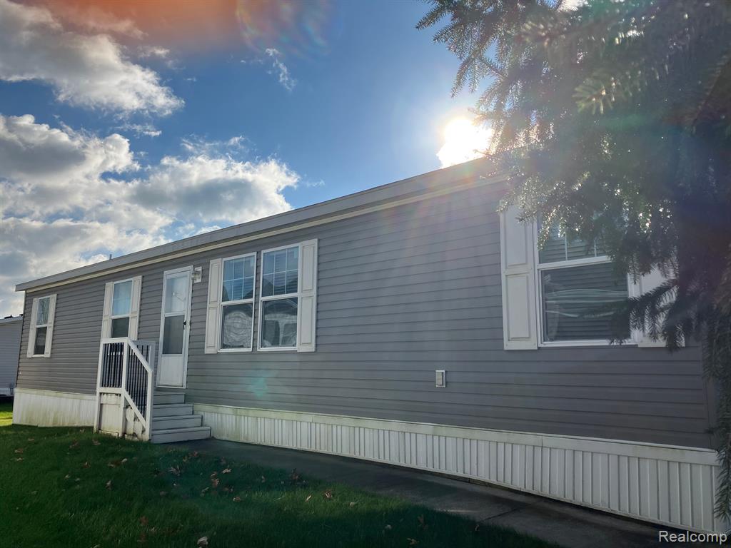 436 Hidden Ridge, Morrice, MI 48857 — front exterior