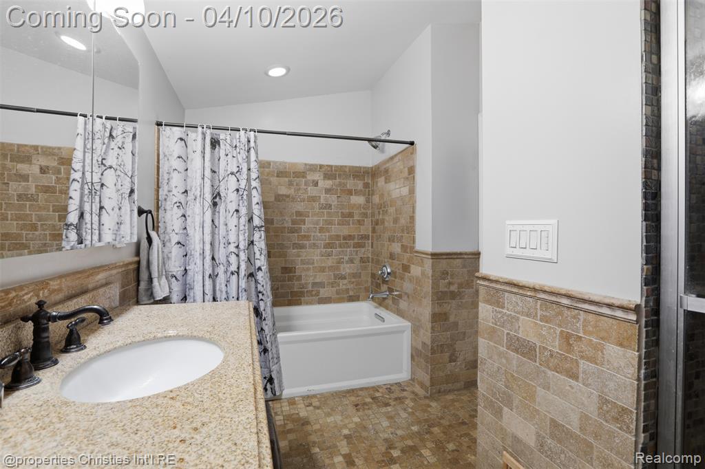 First shower with soaking tub.