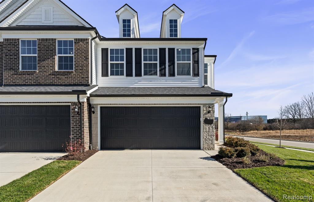 5684 Corgi Drive, Ann Arbor, MI 48108 — front exterior