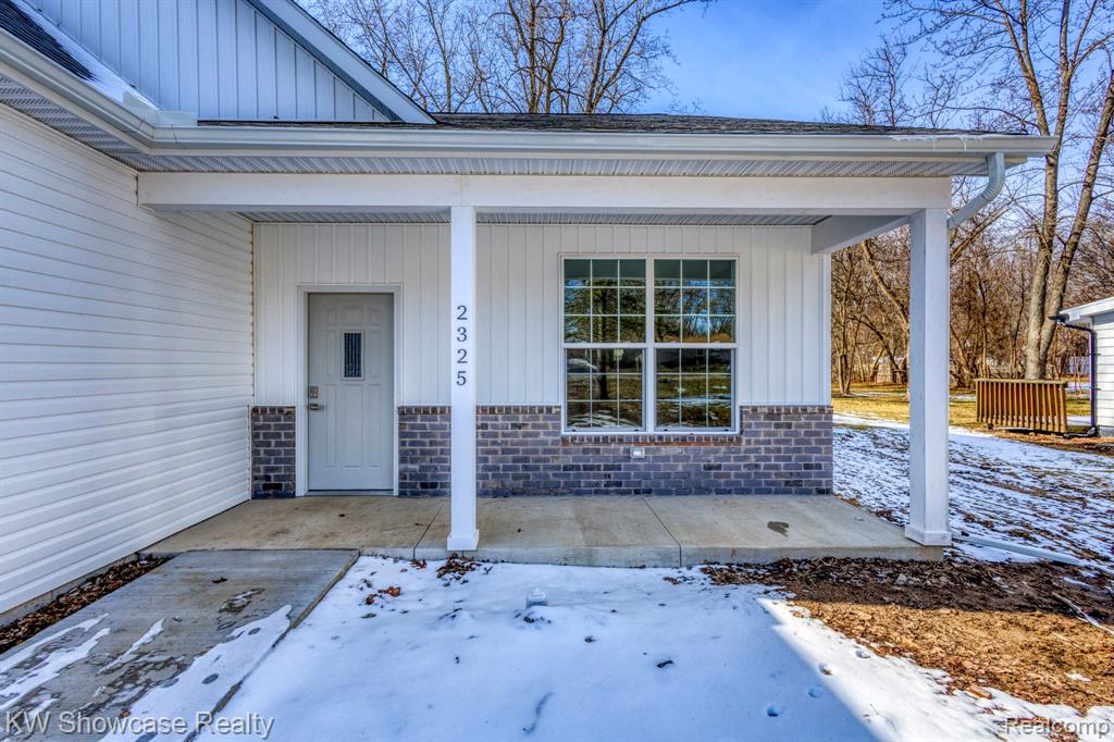 View of 20x10 Covered Rear Porch, Property Under Construction.