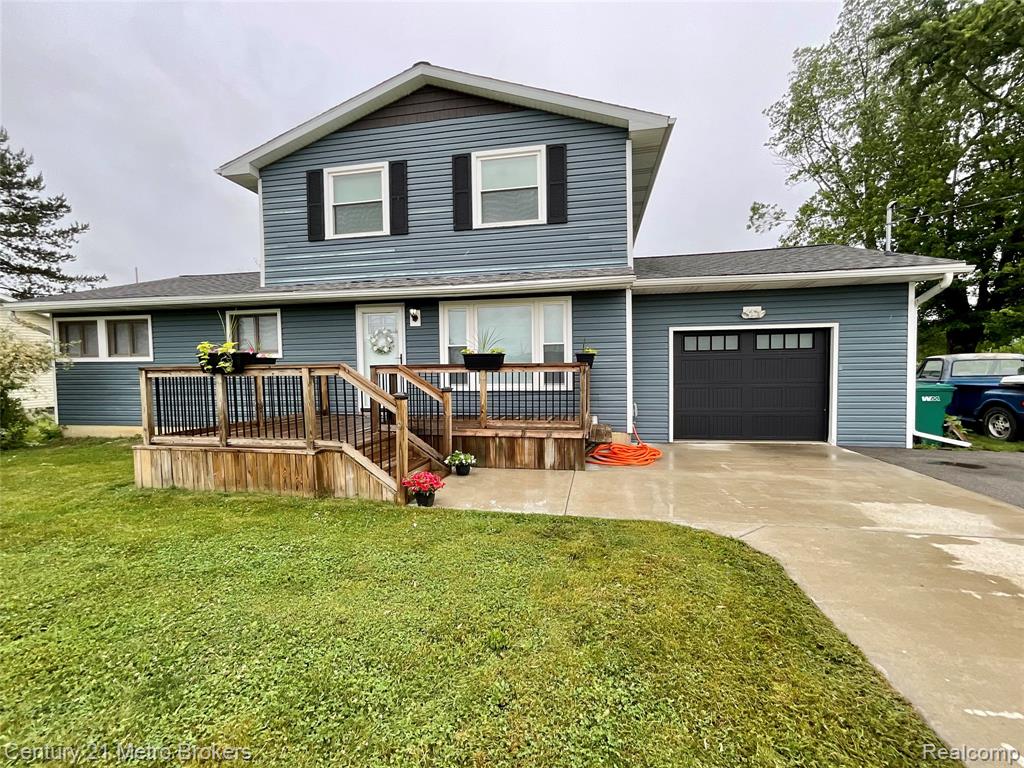 7094 Reid Road, Swartz Creek, MI 48473 — front exterior