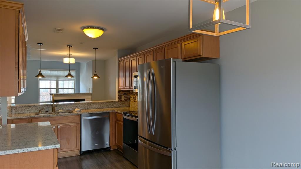 413 VILLAGE Drive, Walled Lake, MI 48390 — Photo 10