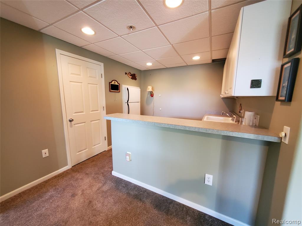7281 Hawthorne Circle, Goodrich Vlg, MI — Photo 28