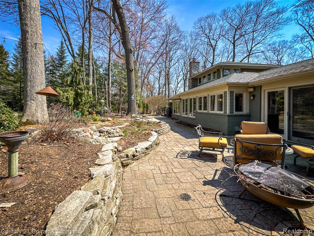 View of patio / terrace featuring a sunroom