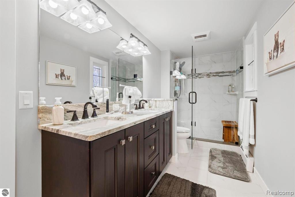 9086 N TOTTENHAM Drive, Traverse City, MI 49685 — Photo 54