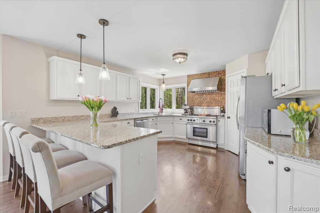 7042 Autumn Wood Drive, Brighton, MI 48116 — Photo 13