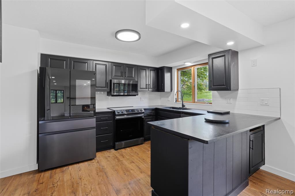 11221 Meadowood Drive, Brighton, MI 48114 — Photo 19
