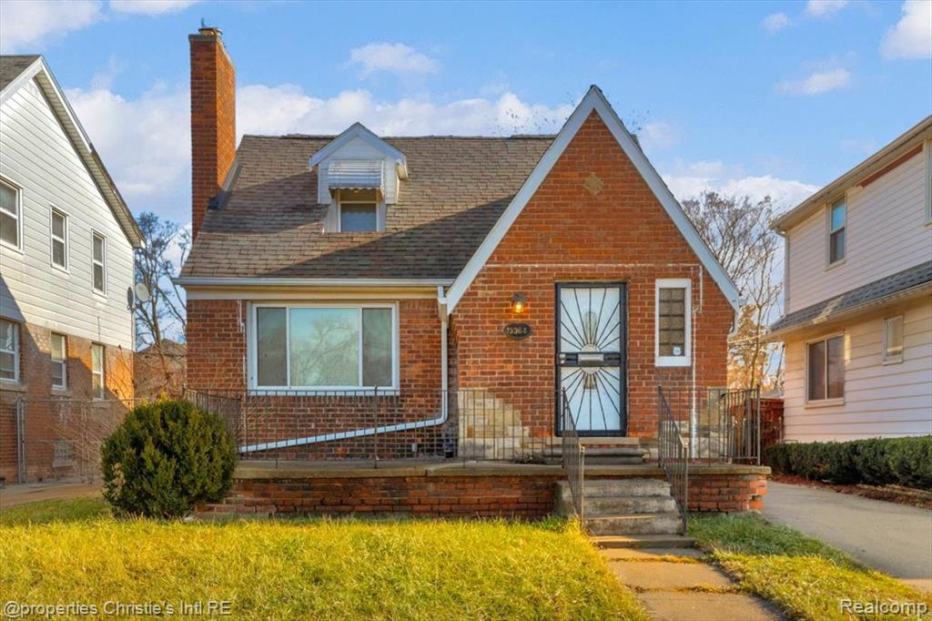 Photo for 13364 Coyle Street, Detroit, MI 48227 - listing #20261001522 View of front of property with brick siding, a chimney, and a shingled roof