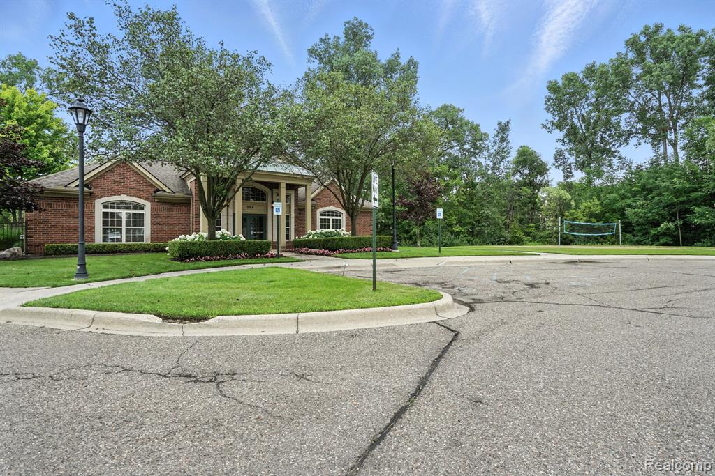 490 Village Drive, Walled Lake, MI 48390 — Photo 23