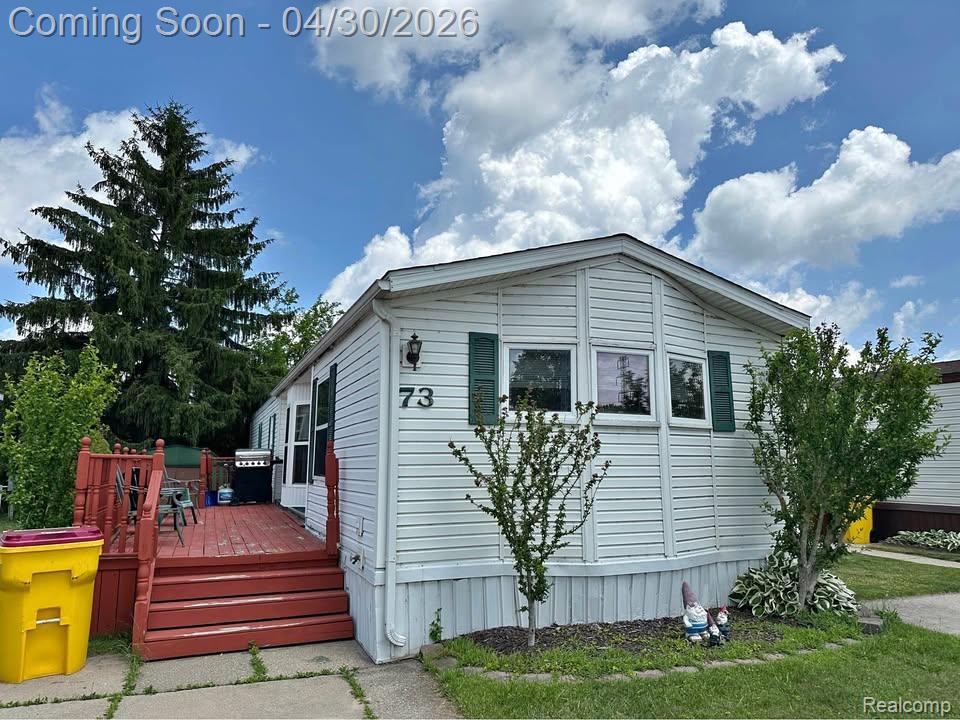831 N Pontiac Trail, 73, Walled Lake, MI 48390 — front exterior